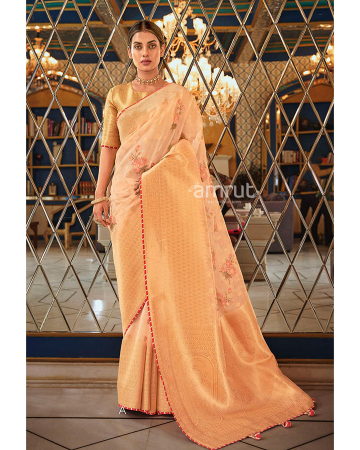 Extravagant Peach Shade Wedding Saree With Golden Blouse