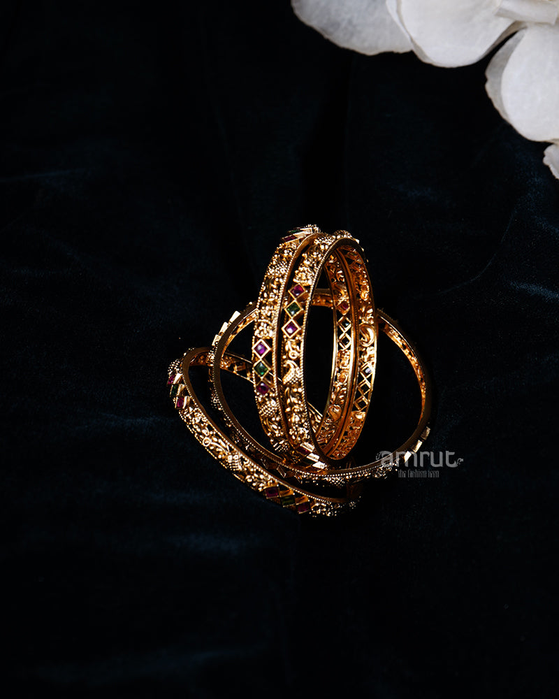 Gold-Toned Bangles with Red and Green Gemstone Accents 01