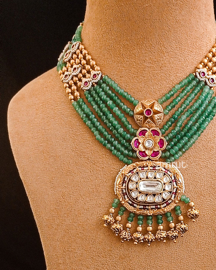 Gold Finish Layered Kundan Choker And Green Stone Necklace Set