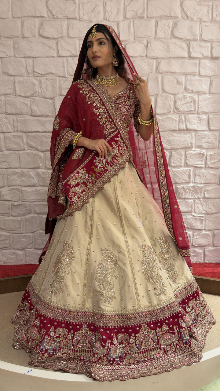 Ivory & Maroon Royal Bridal Lehenga Set with Heritage Embroidery and Net Dupatta
