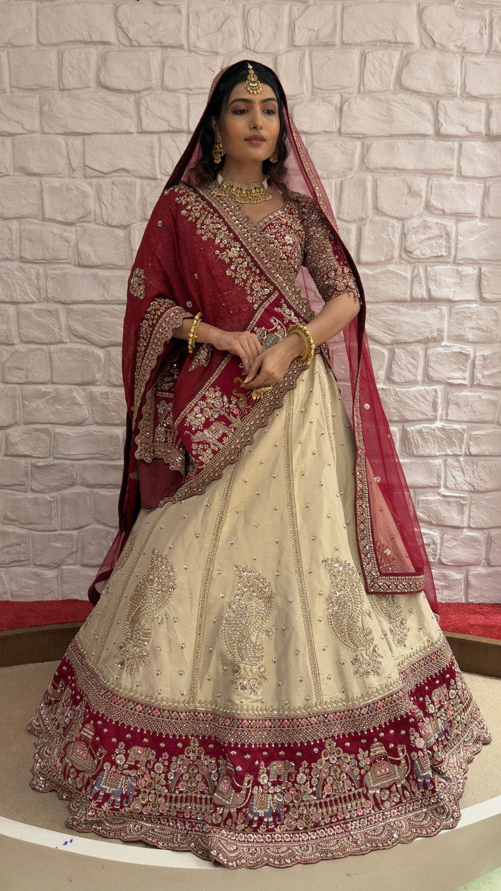 Ivory & Maroon Royal Bridal Lehenga Set with Heritage Embroidery and Net Dupatta