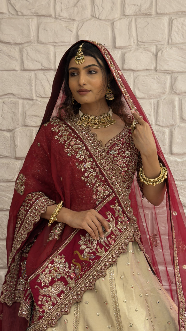 Ivory & Maroon Royal Bridal Lehenga Set with Heritage Embroidery and Net Dupatta