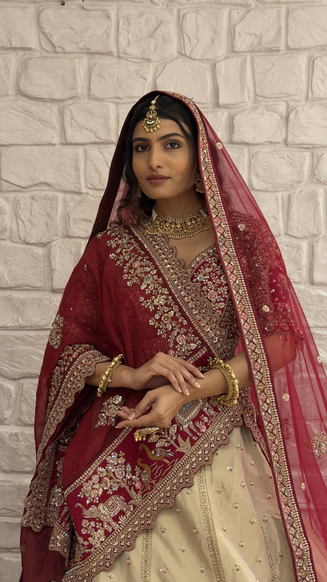 Ivory & Maroon Royal Bridal Lehenga Set with Heritage Embroidery and Net Dupatta