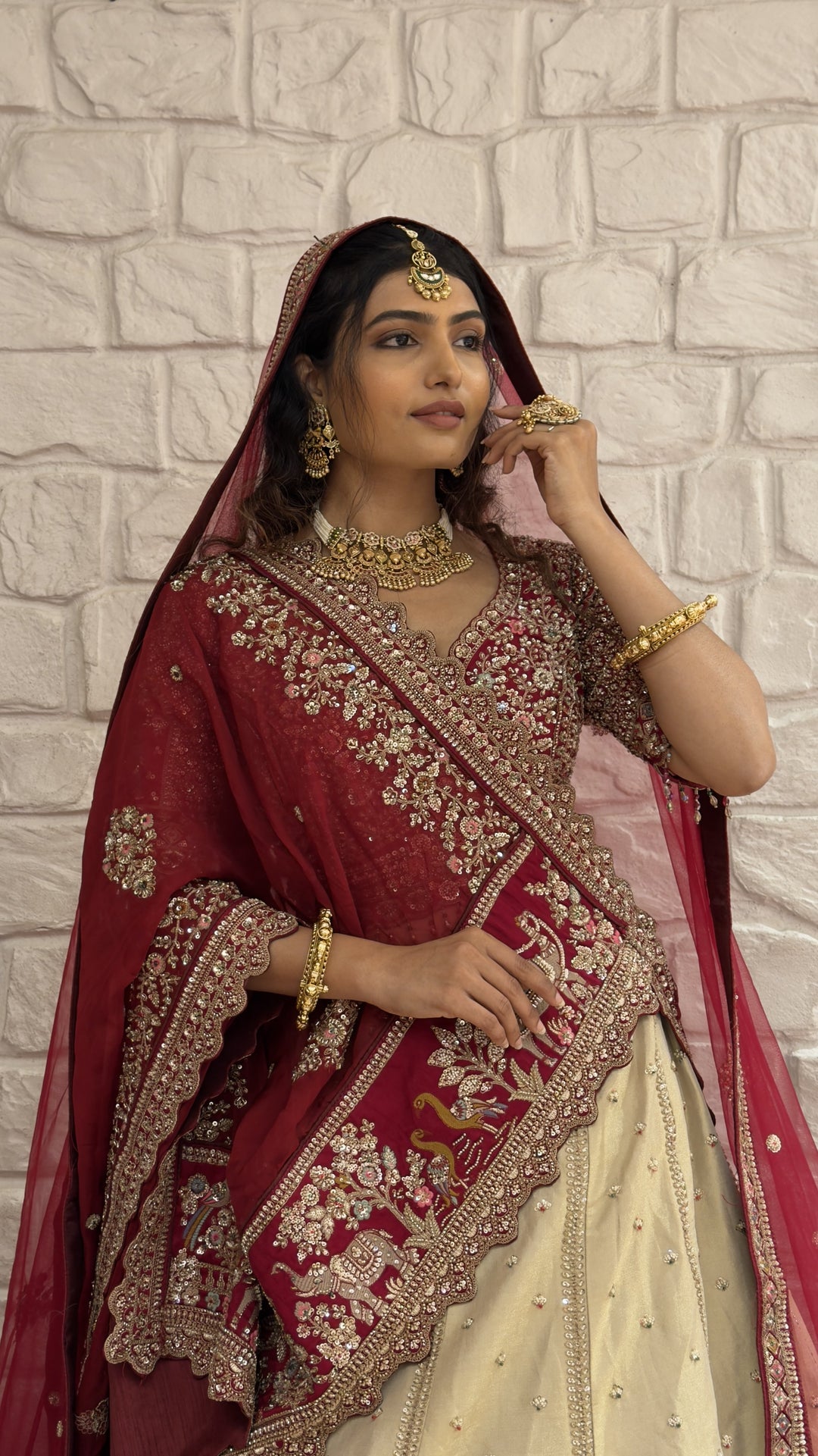 Ivory & Maroon Royal Bridal Lehenga Set with Heritage Embroidery and Net Dupatta
