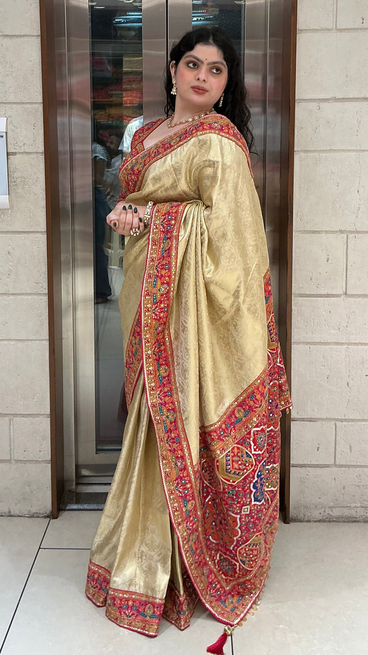 Champagne Gold Banarasi Silk Saree with Red Multicolour Embroidered Border