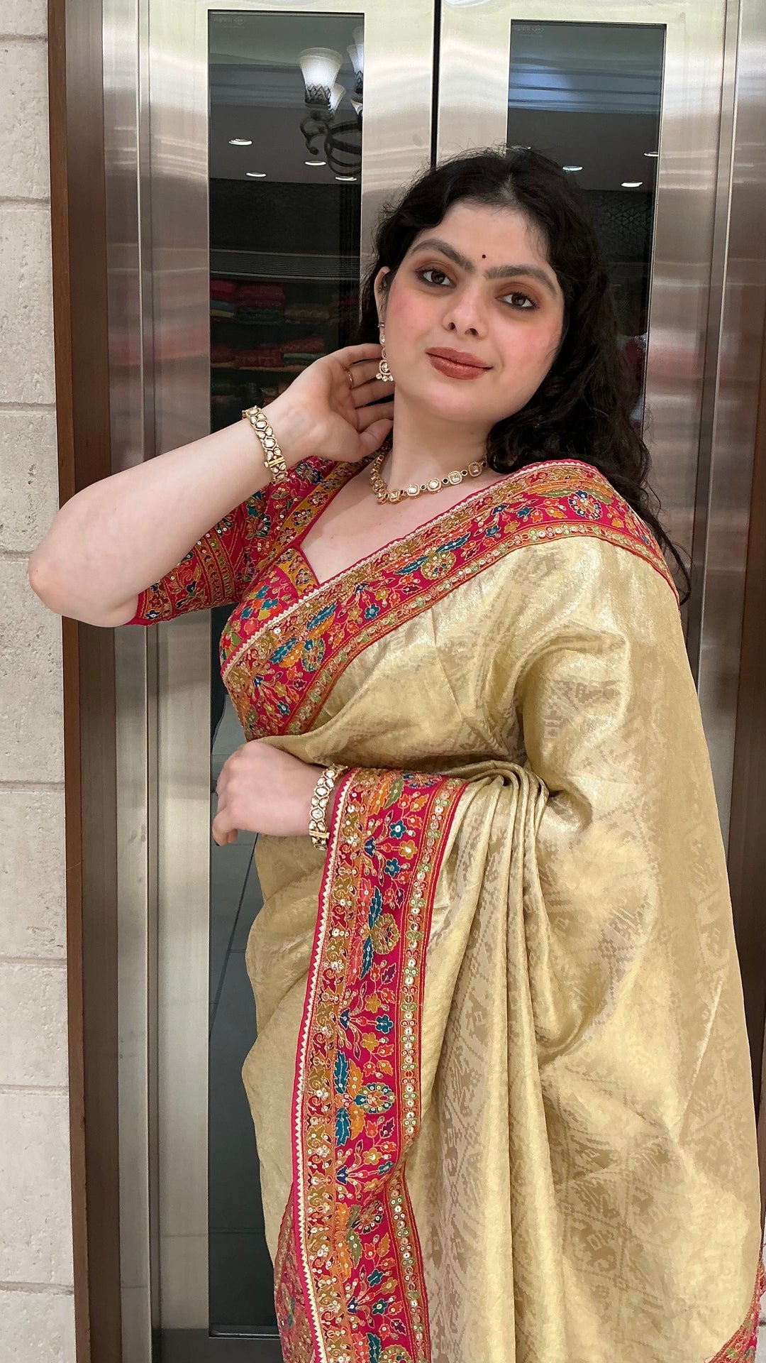 Champagne Gold Banarasi Silk Saree with Red Multicolour Embroidered Border