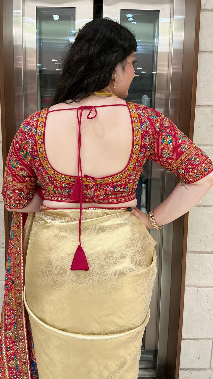 Champagne Gold Banarasi Silk Saree with Red Multicolour Embroidered Border