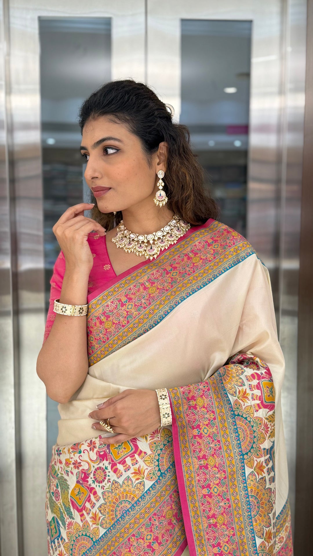 Ivory Banarasi Silk Saree with Multicolor Meenakari Weave & Contrast Pink Border