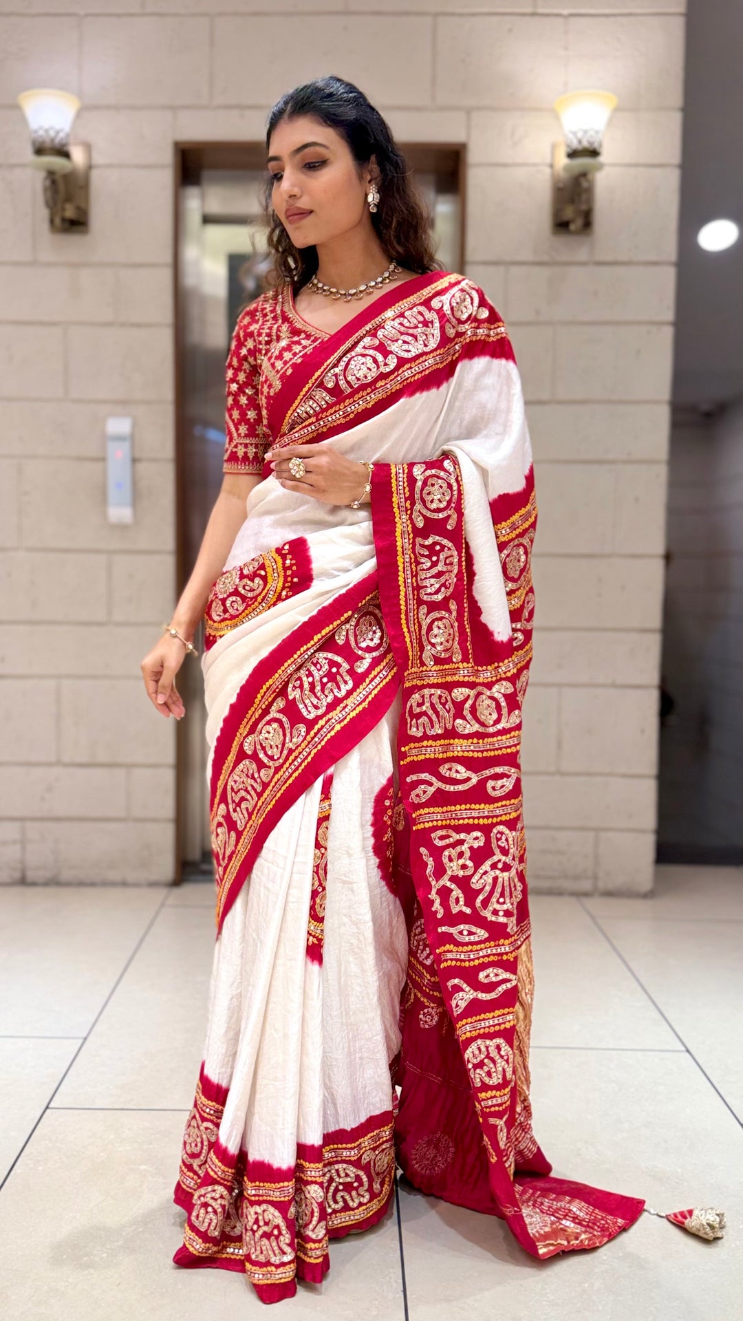 White & Red Traditional Designer Saree with Embroidered Border and Matching Blouse