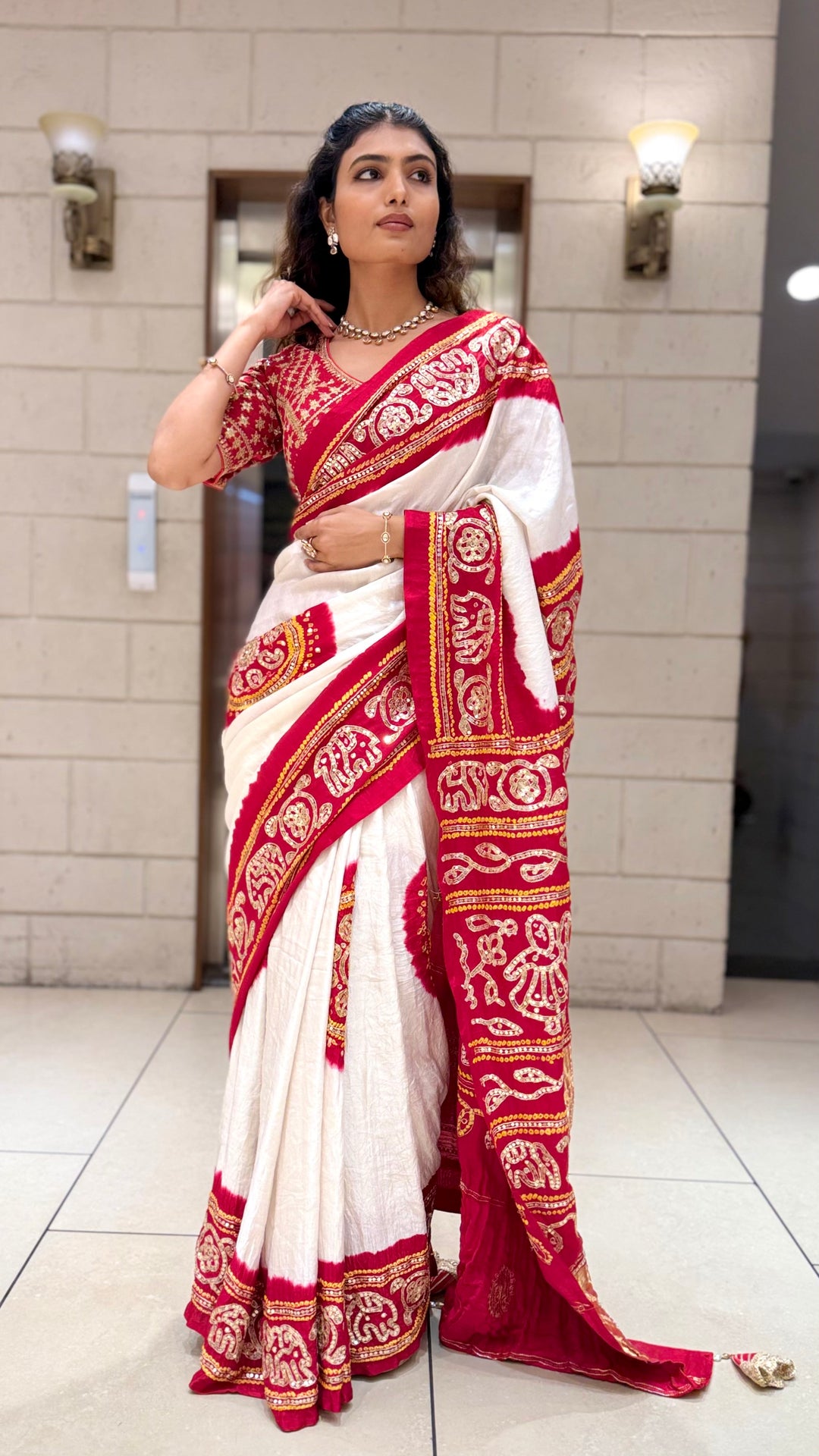 White & Red Traditional Designer Saree with Embroidered Border and Matching Blouse