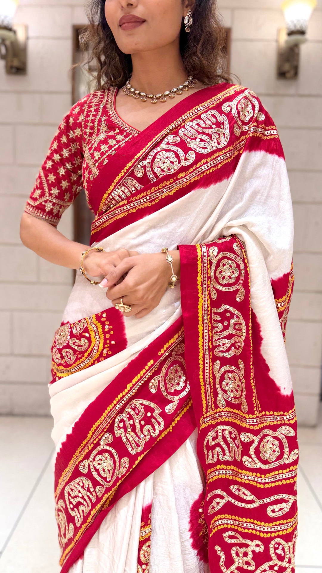 White & Red Traditional Designer Saree with Embroidered Border and Matching Blouse