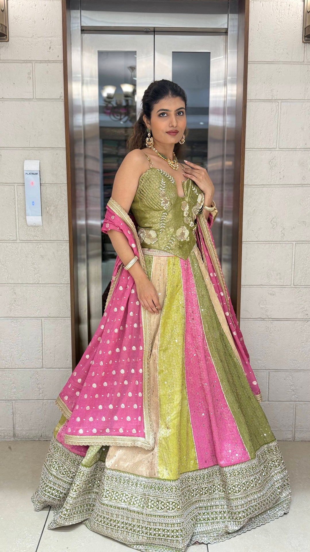 Multicolor Panelled Sequin Lehenga with Hand-Embroidered Corset Blouse