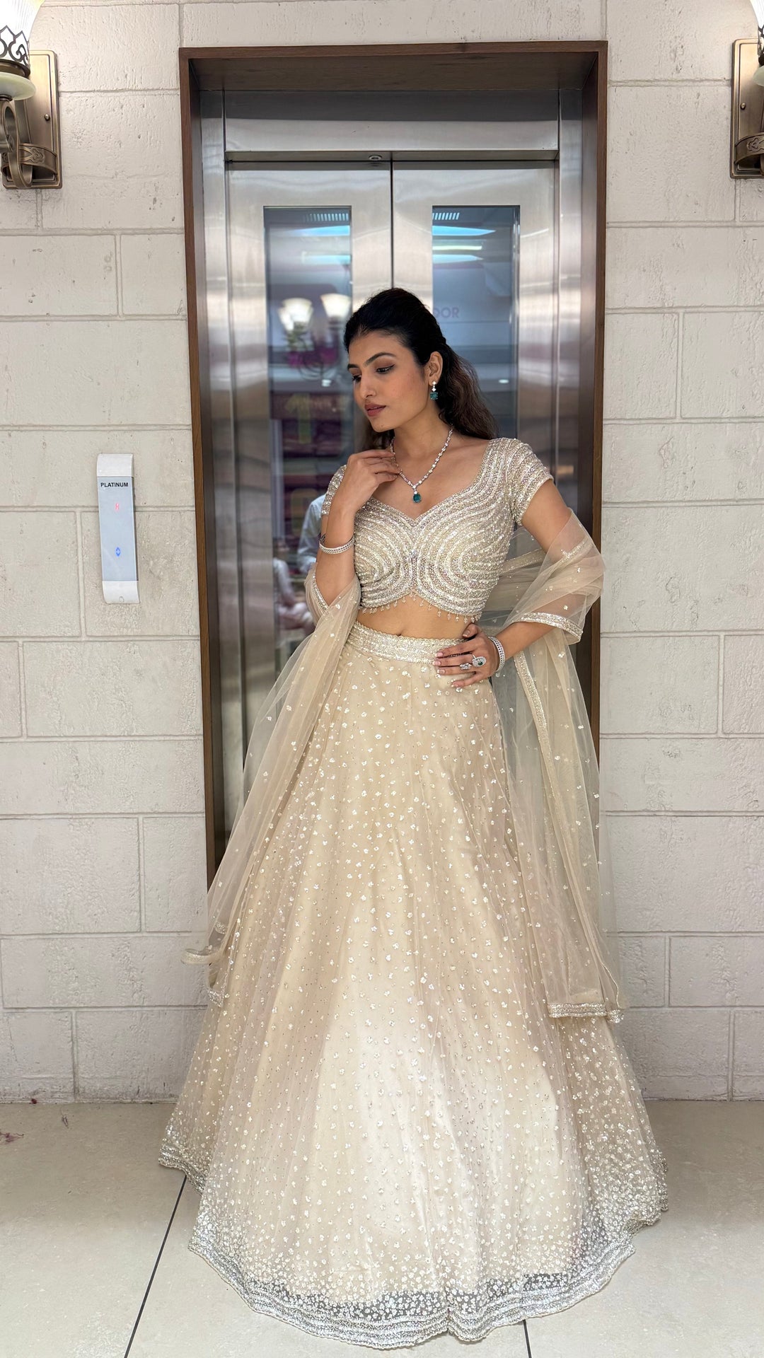 Champagne Sequin Embellished Lehenga with Wave Pattern Blouse & Sheer Dupatta