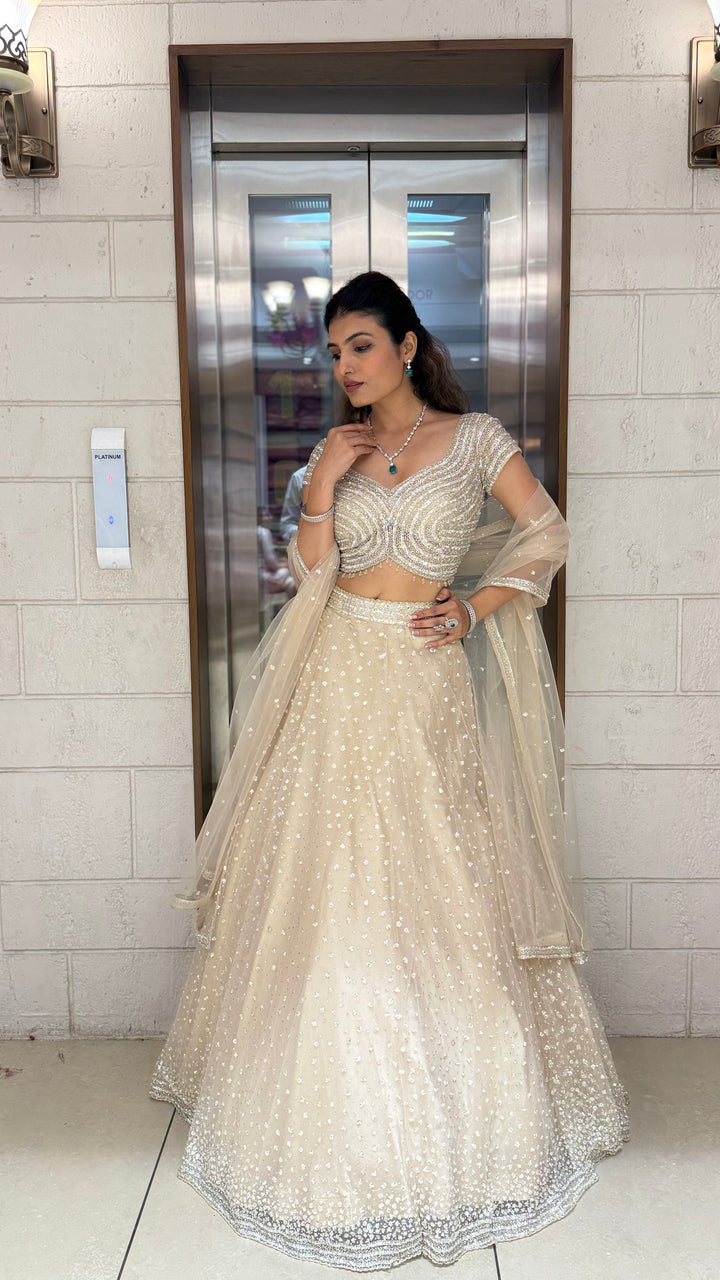 Champagne Sequin Embellished Lehenga with Wave Pattern Blouse & Sheer Dupatta