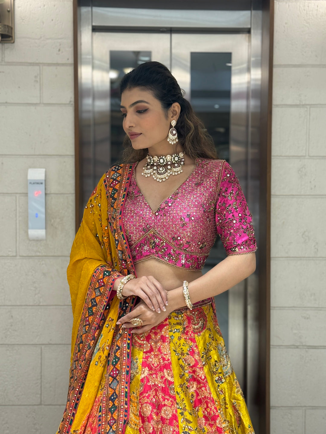 Rani Pink & Mustard Patola Print Mirror Work Lehenga with Hand-Embroidered Blouse