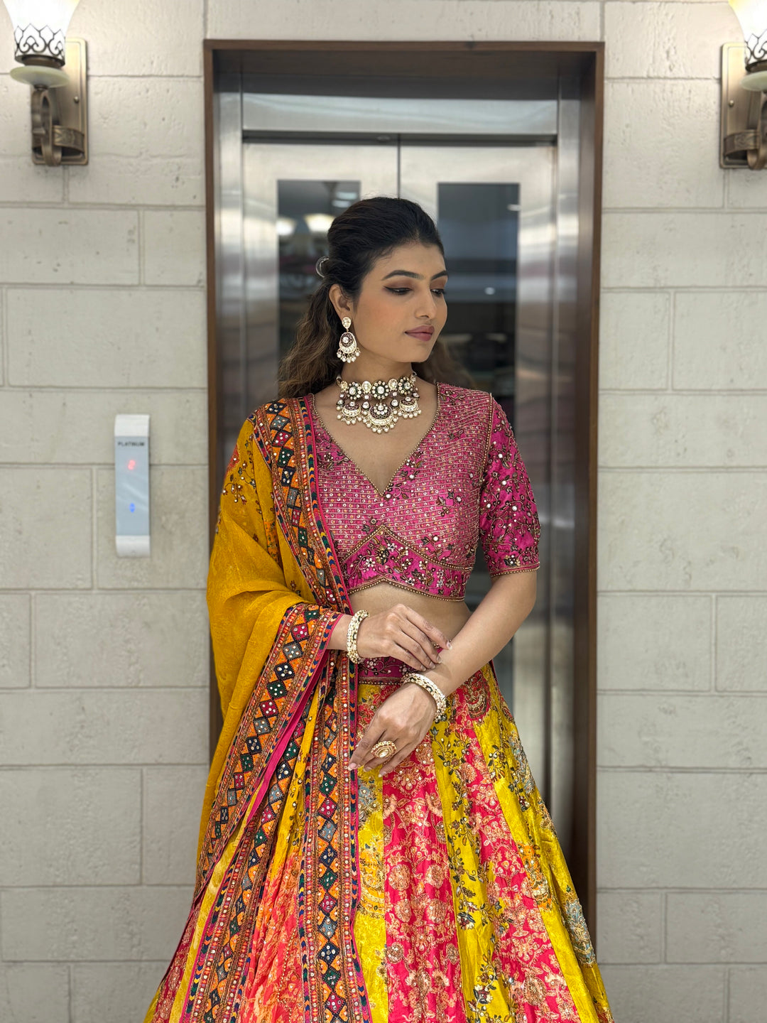 Rani Pink & Mustard Patola Print Mirror Work Lehenga with Hand-Embroidered Blouse