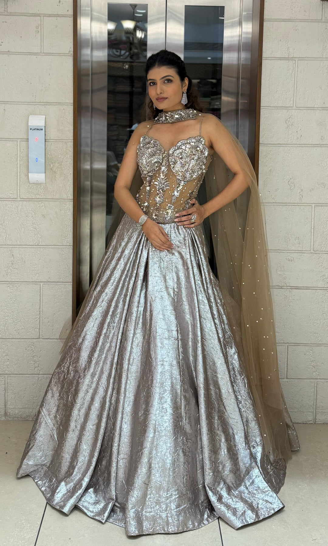 Metallic Silver Lehenga Choli with 3D Crystal Corset & Sheer Cape Dupatta