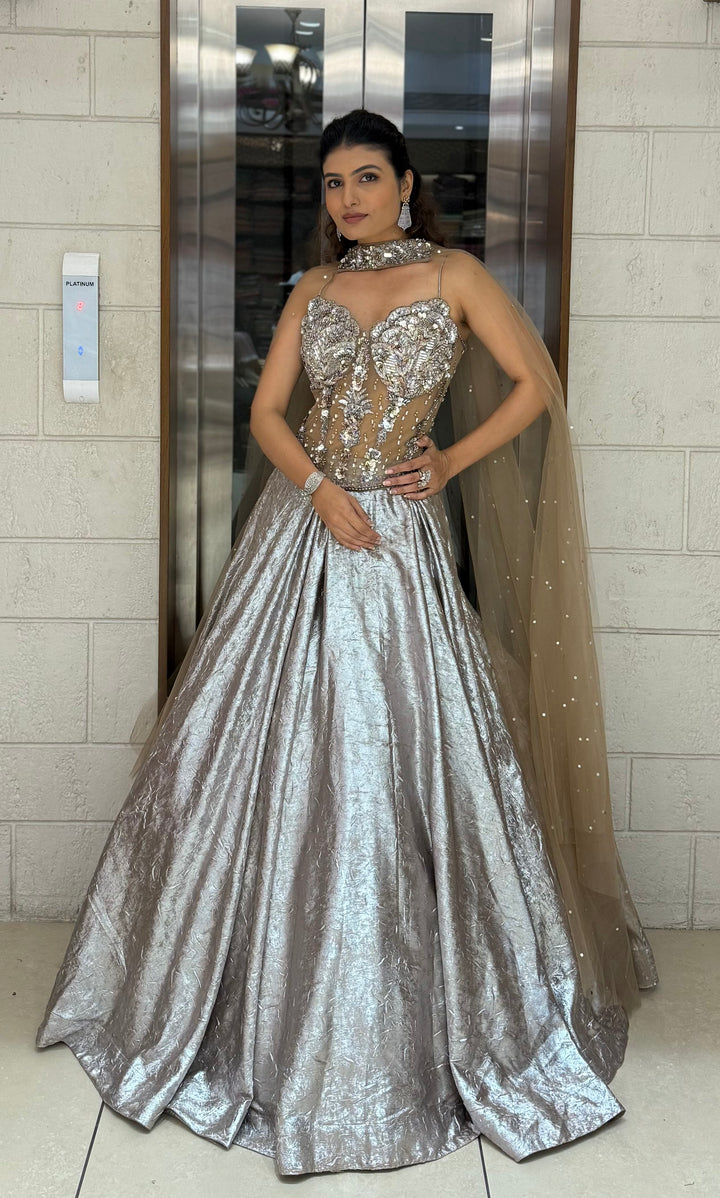 Metallic Silver Lehenga Choli with 3D Crystal Corset & Sheer Cape Dupatta