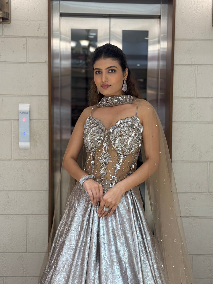 Metallic Silver Lehenga Choli with 3D Crystal Corset & Sheer Cape Dupatta