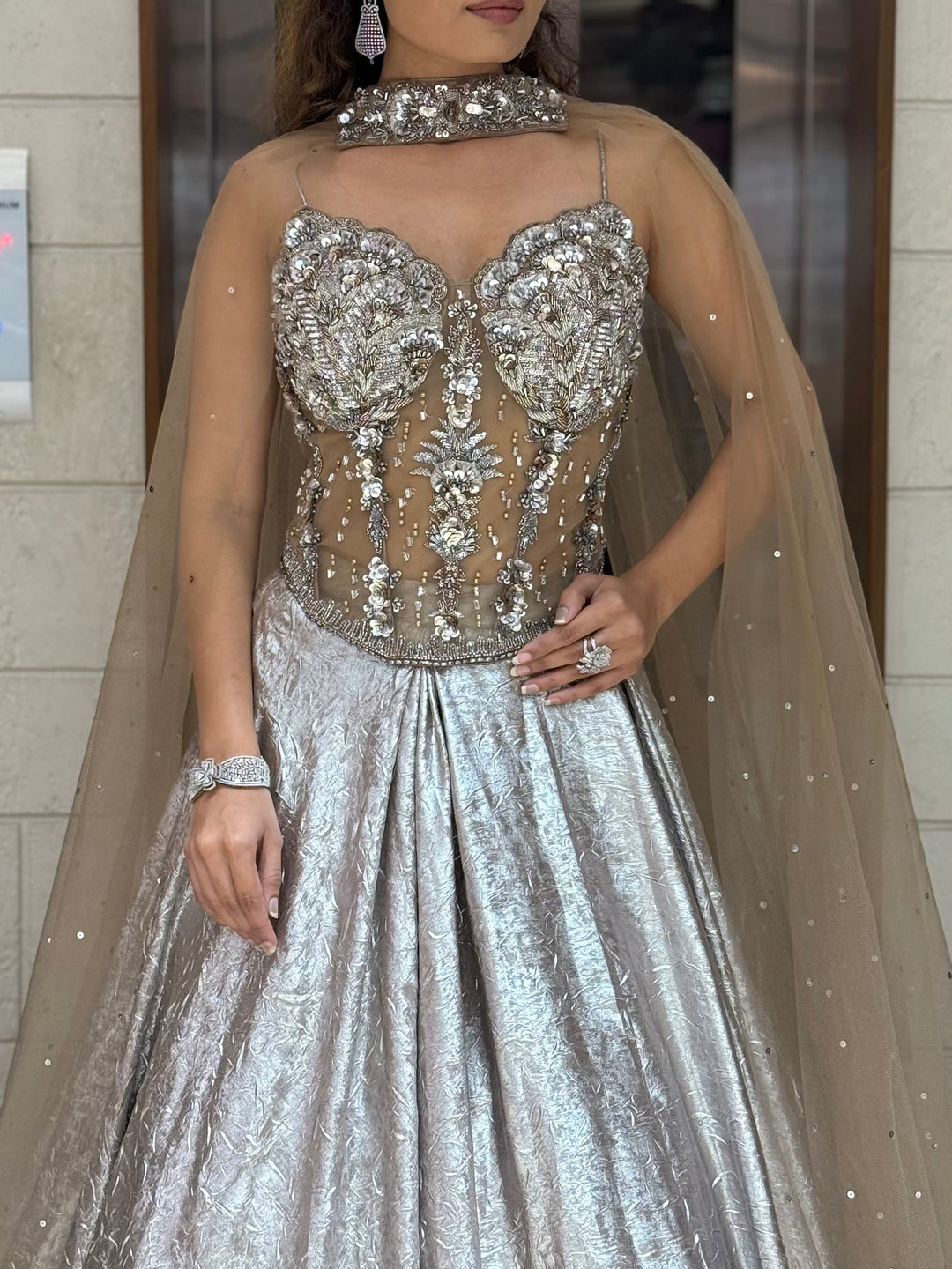 Metallic Silver Lehenga Choli with 3D Crystal Corset & Sheer Cape Dupatta