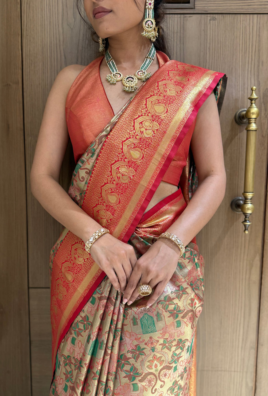 Kanjivaram Banarasi Silk Saree in Coral Orange with Zari Weaving