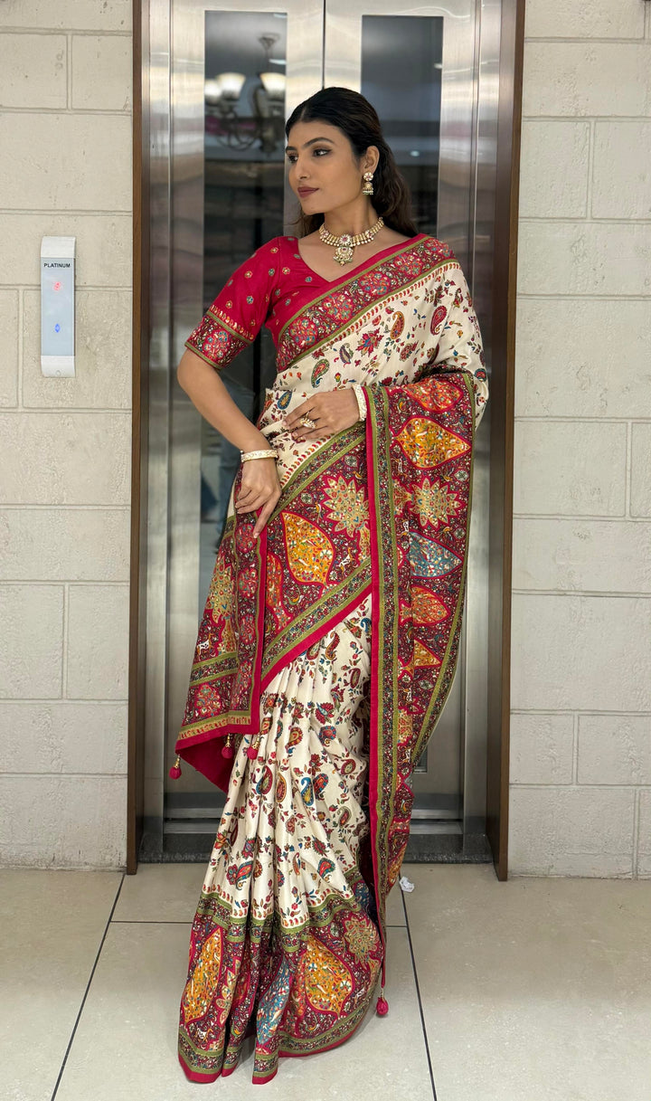 Cream Silk Patola Print Saree with Hand-Embroidered Border & Tassels
