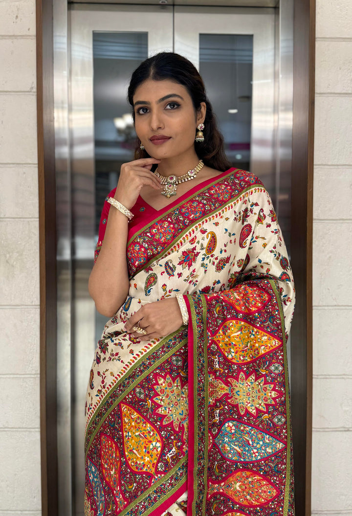 Cream Silk Patola Print Saree with Hand-Embroidered Border & Tassels