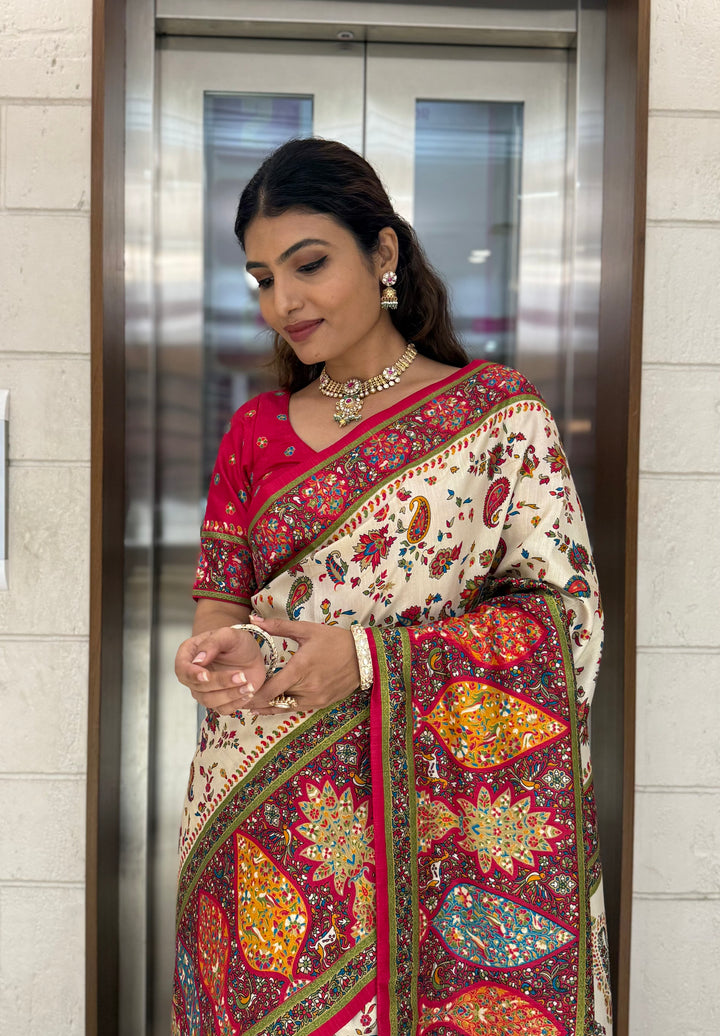 Cream Silk Patola Print Saree with Hand-Embroidered Border & Tassels