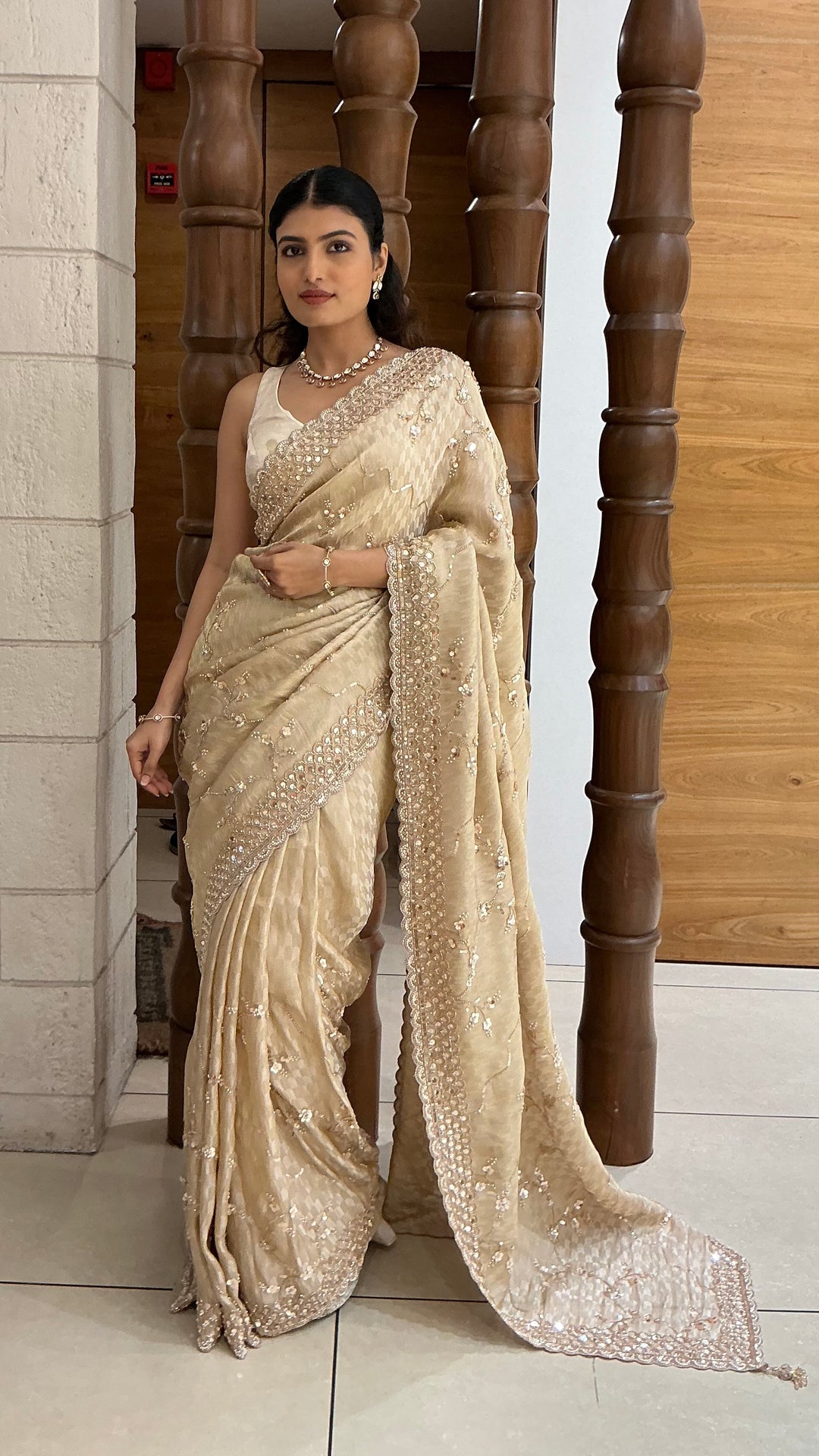 Champagne Gold Designer Tissue Silk Saree with Hand Embroidered Scalloped Border