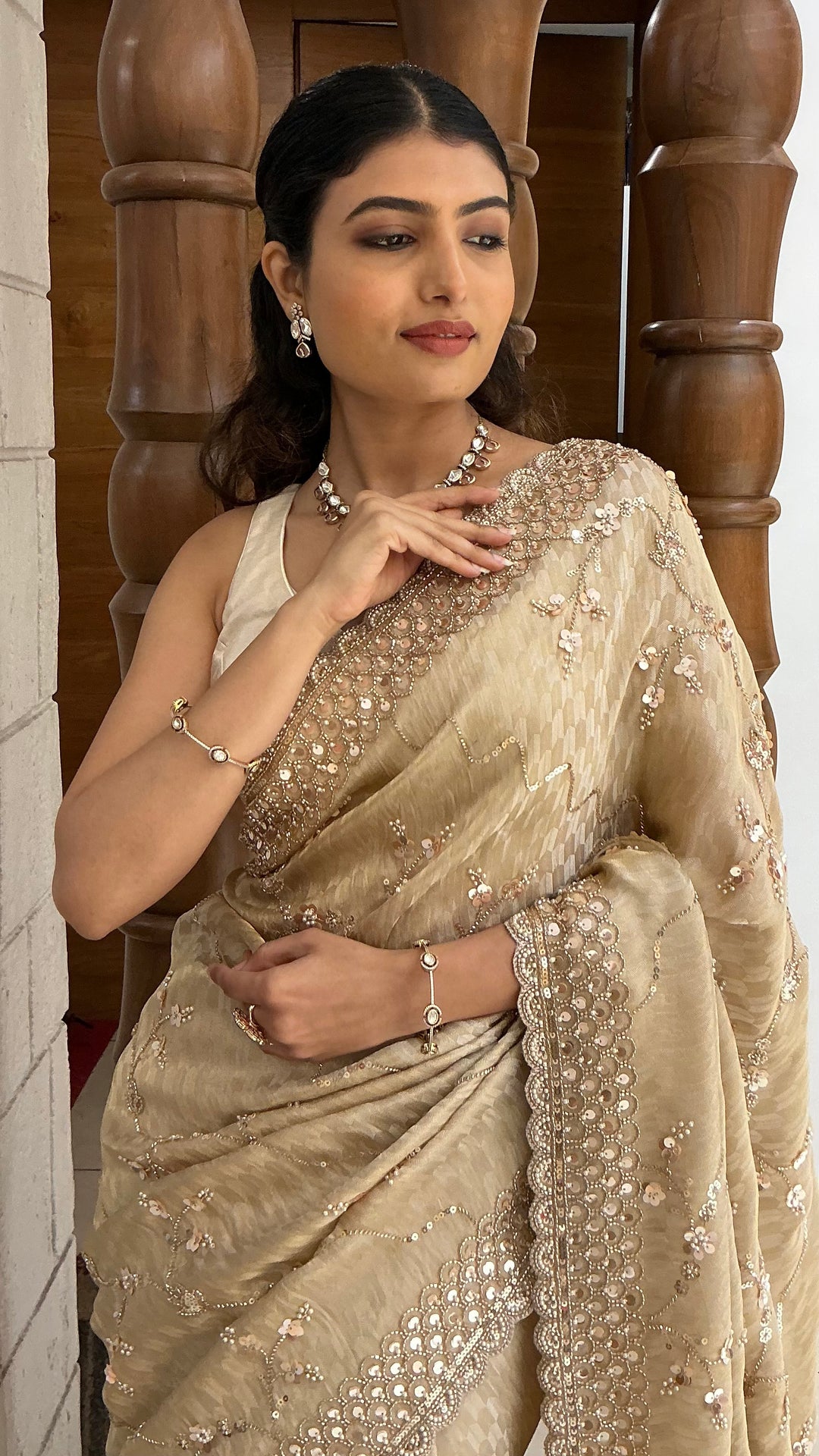 Champagne Gold Designer Tissue Silk Saree with Hand Embroidered Scalloped Border