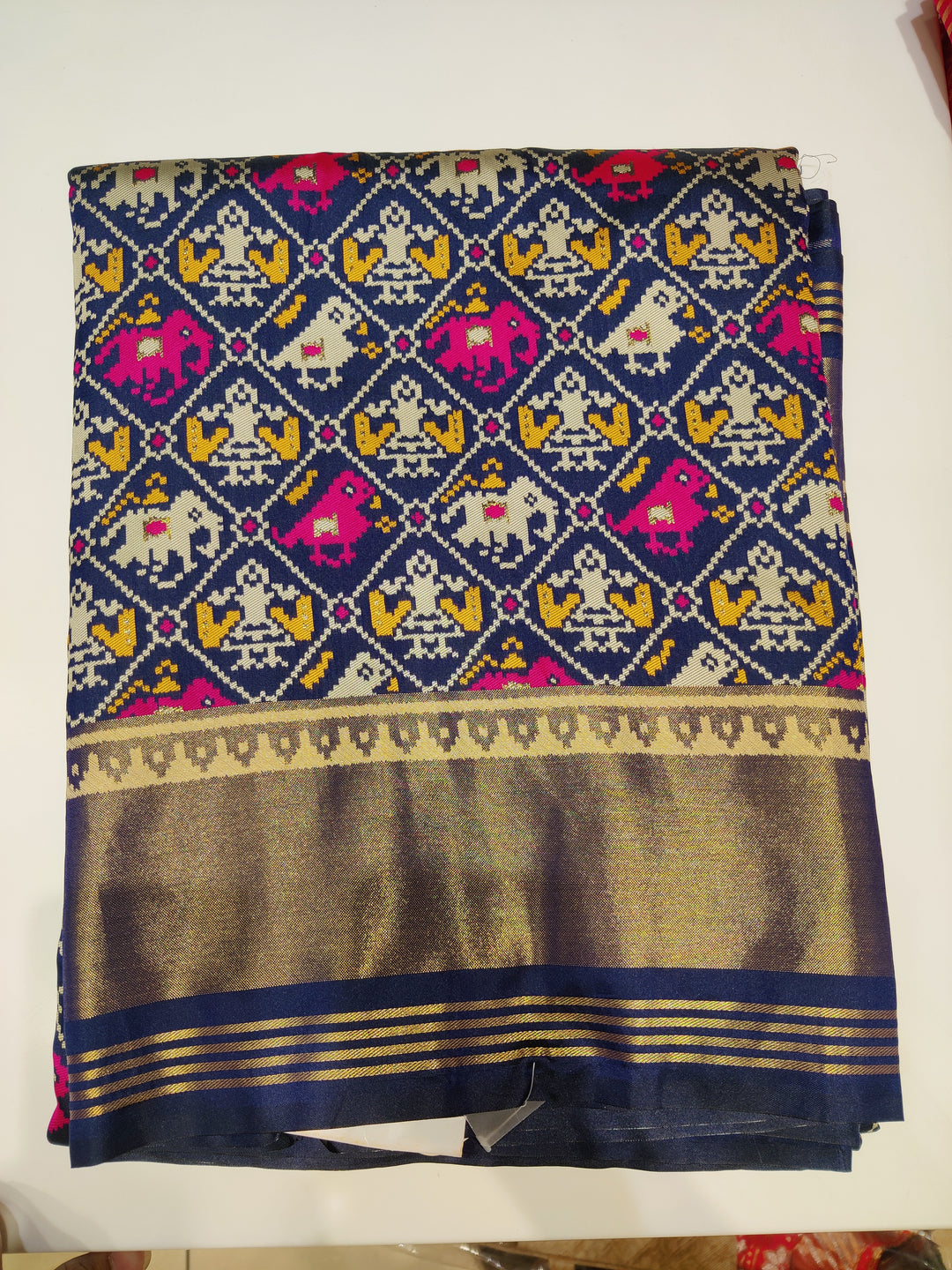 Patola Weaving Silk Saree with Traditional Ikat Diamond Weave & Rich Zari Border