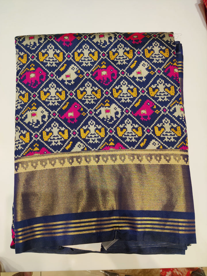 Patola Weaving Silk Saree with Traditional Ikat Diamond Weave & Rich Zari Border