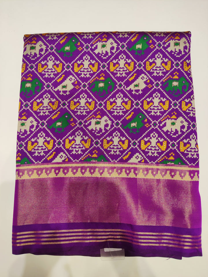 Patola Weaving Silk Saree with Traditional Ikat Diamond Weave & Rich Zari Border