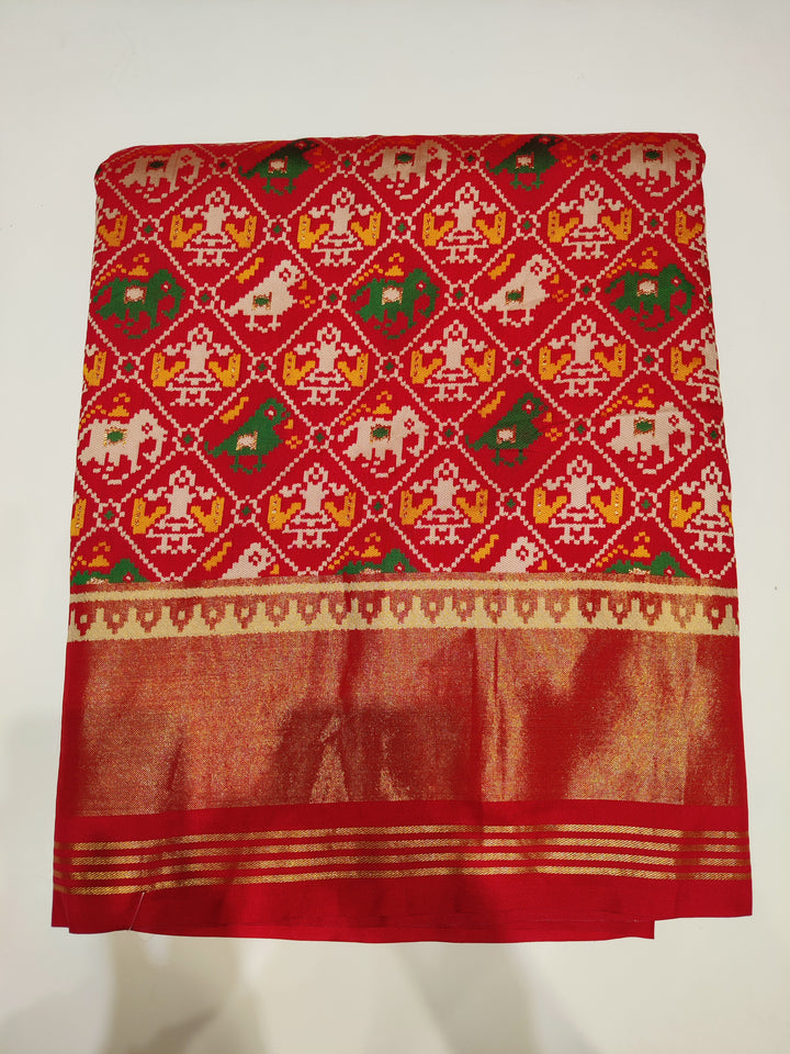 Patola Weaving Silk Saree with Traditional Ikat Diamond Weave & Rich Zari Border