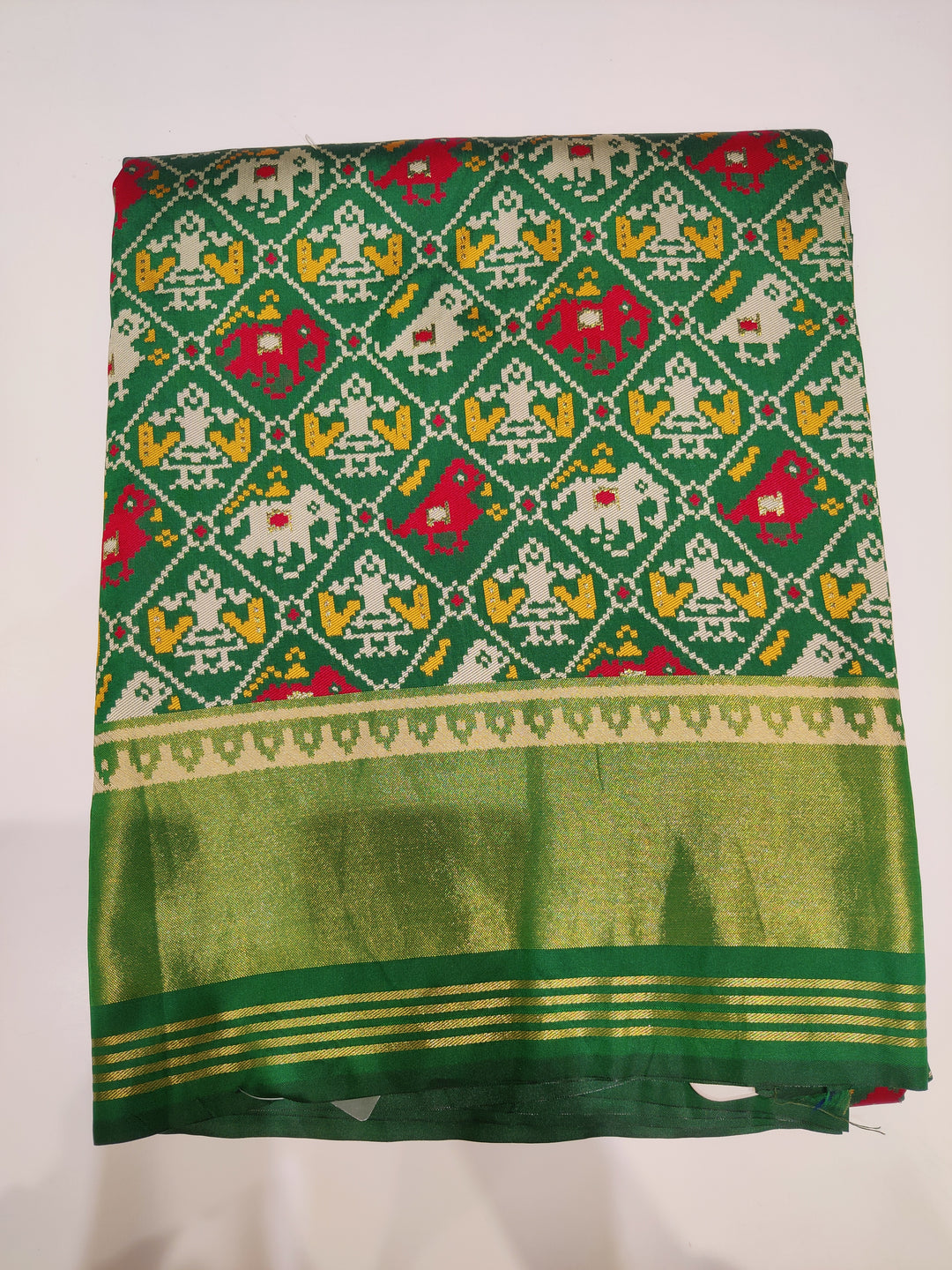 Patola Weaving Silk Saree with Traditional Ikat Diamond Weave & Rich Zari Border