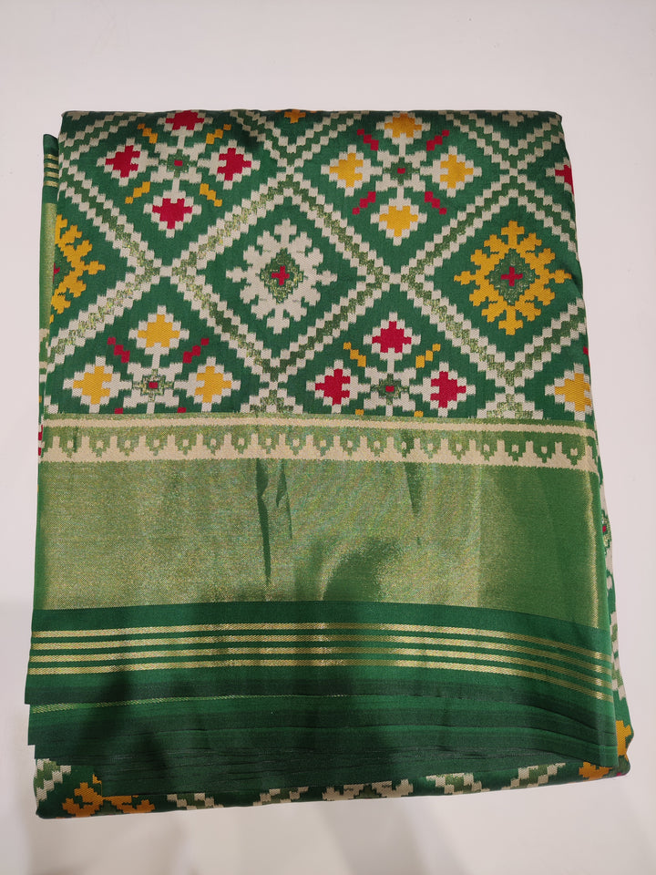 Patola Weaving Silk Saree with Traditional Geometric Ikat Design & Rich Zari Border