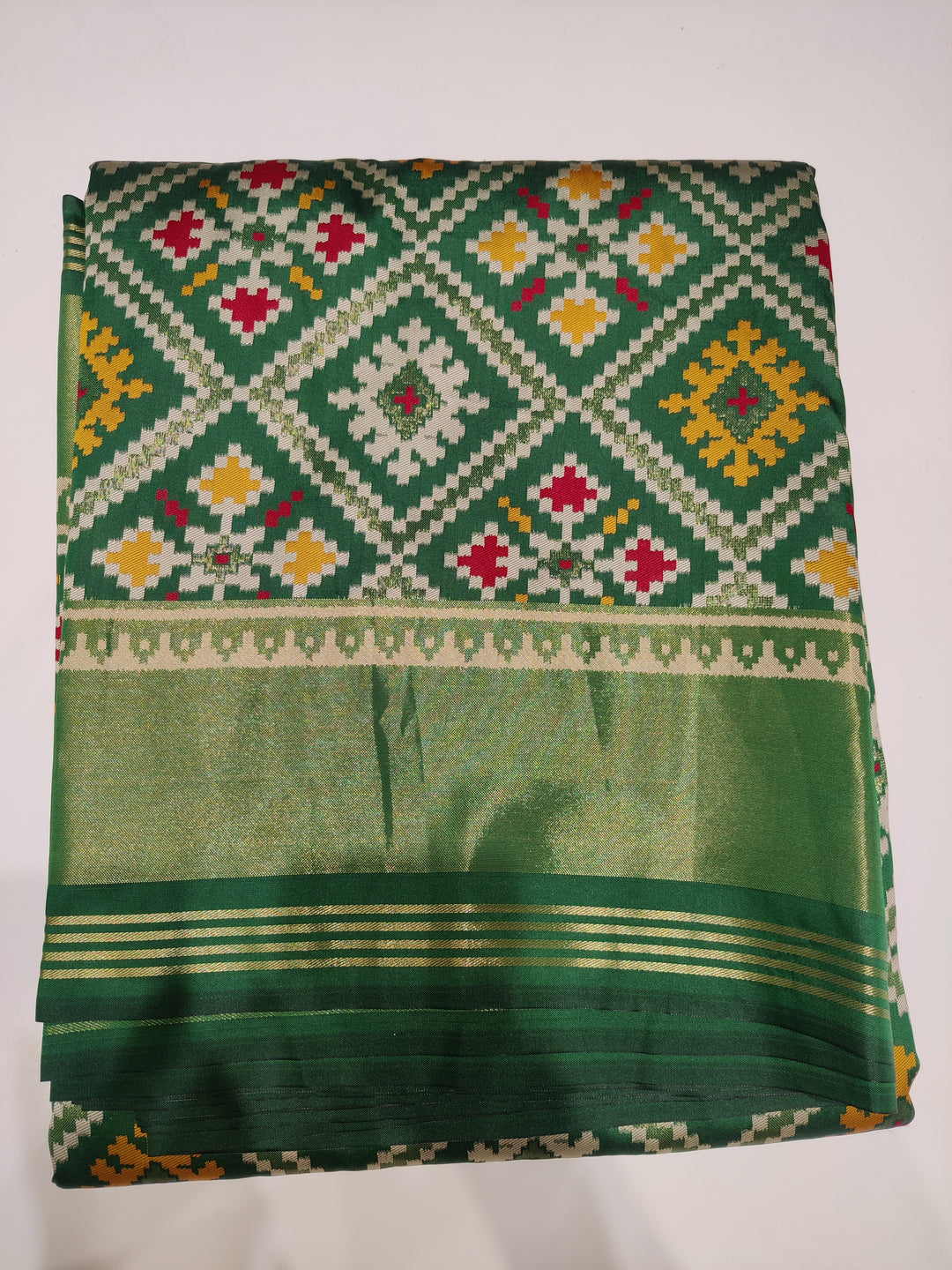 Patola Weaving Silk Saree with Traditional Geometric Ikat Design & Rich Zari Border