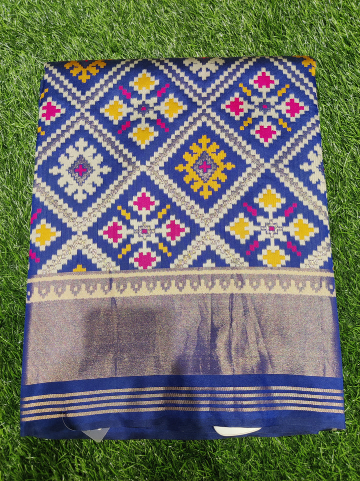 Patola Weaving Silk Saree with Traditional Geometric Ikat Design & Rich Zari Border