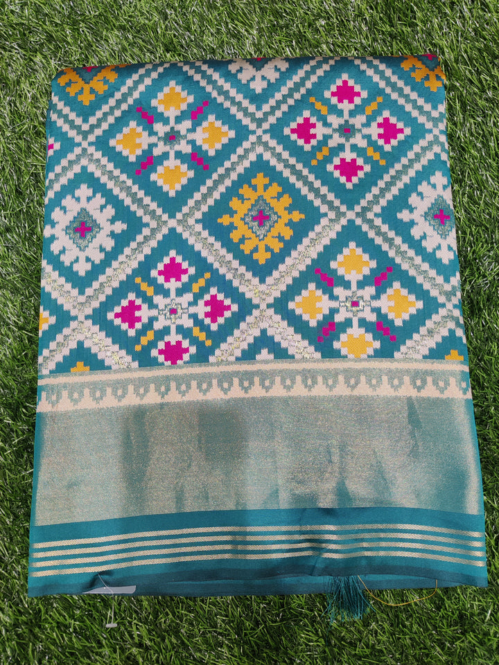 Patola Weaving Silk Saree with Traditional Geometric Ikat Design & Rich Zari Border