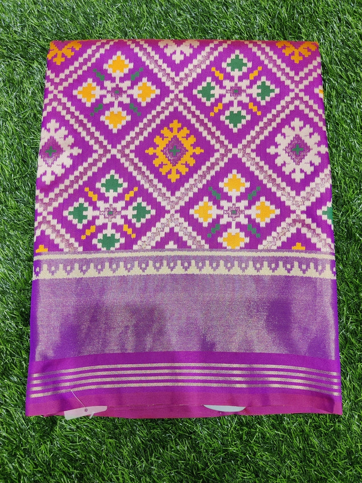 Patola Weaving Silk Saree with Traditional Geometric Ikat Design & Rich Zari Border