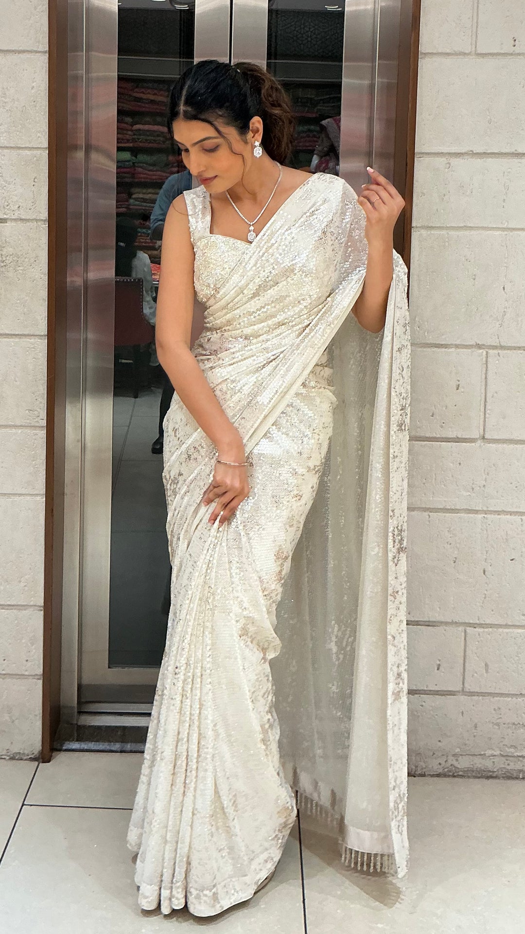 Ivory White Sequins Designer Saree with One-Shoulder Embellished Blouse