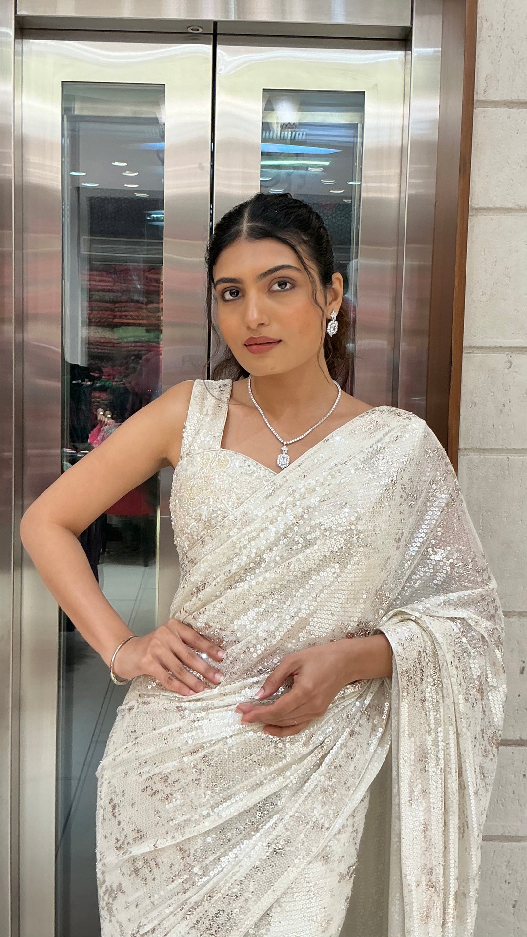 Ivory White Sequins Designer Saree with One-Shoulder Embellished Blouse