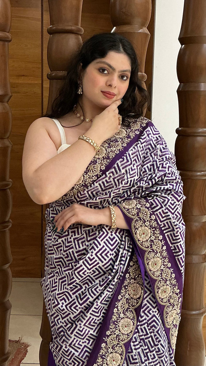 Royal Purple Geometric Print Saree with Ornate Embroidered Border
