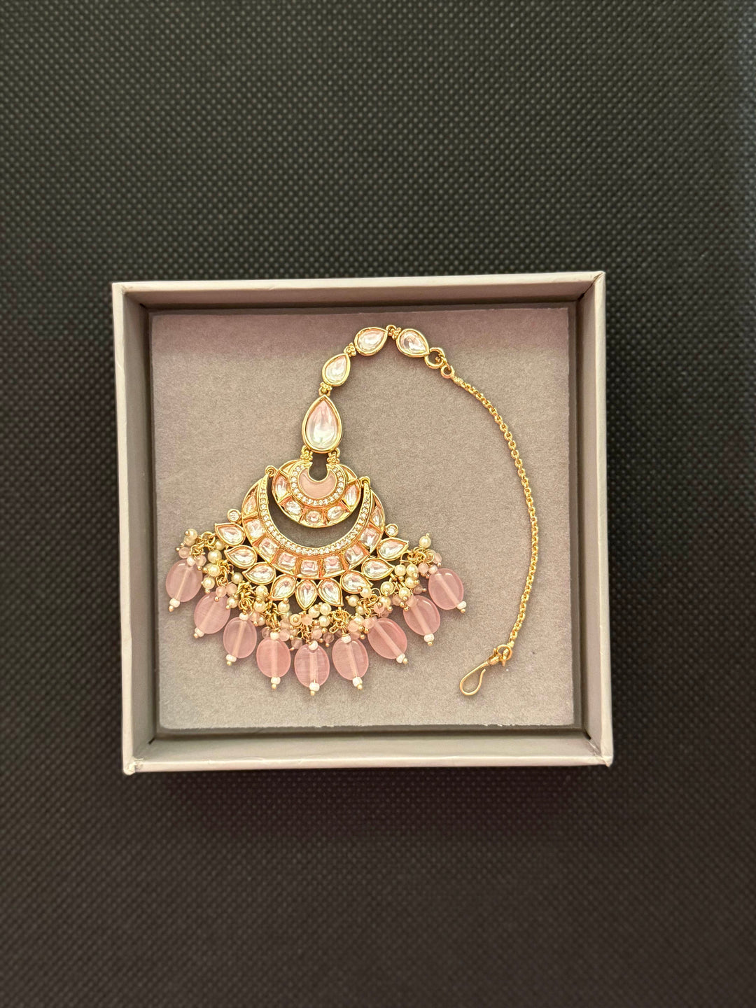 Gold-Plated Kundan Choker Necklace with Pink Bead Detailing & Matching Maang Tikka