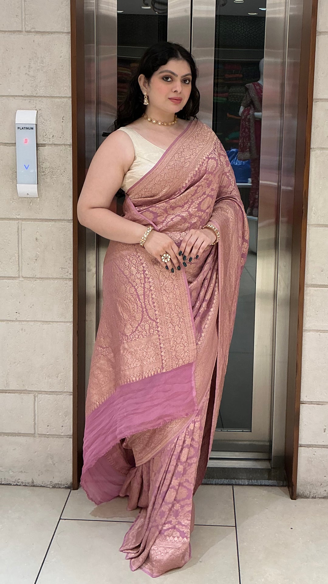 Blush Pink Banarasi Silk Saree with All-Over Floral Zari Weaving