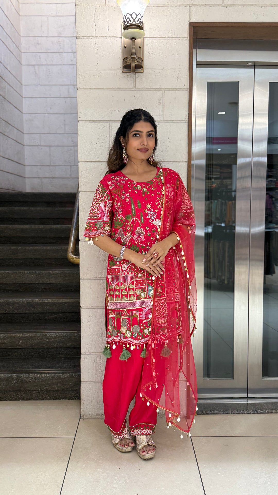 Vibrant Red Designer Kurta Set with Multicolor Embroidery & Tassel Dupatta