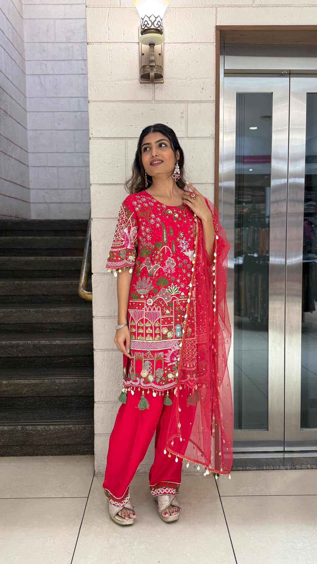 Vibrant Red Designer Kurta Set with Multicolor Embroidery & Tassel Dupatta