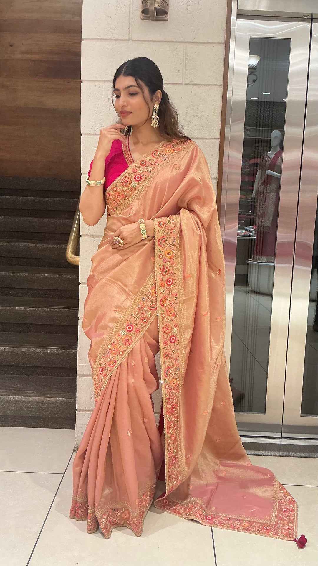 Elegant Peach Gold Designer Saree with Floral Embroidered Border & Rani Pink Blouse