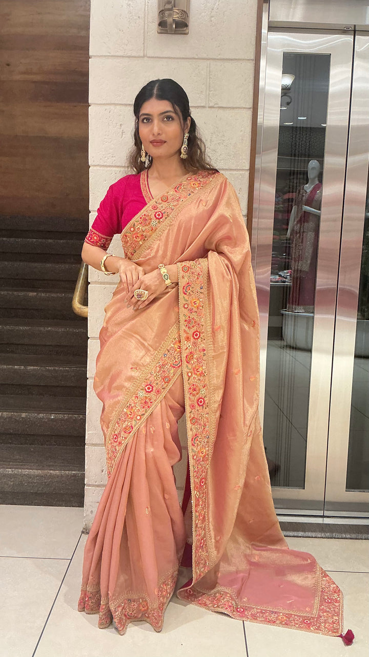Elegant Peach Gold Designer Saree with Floral Embroidered Border & Rani Pink Blouse