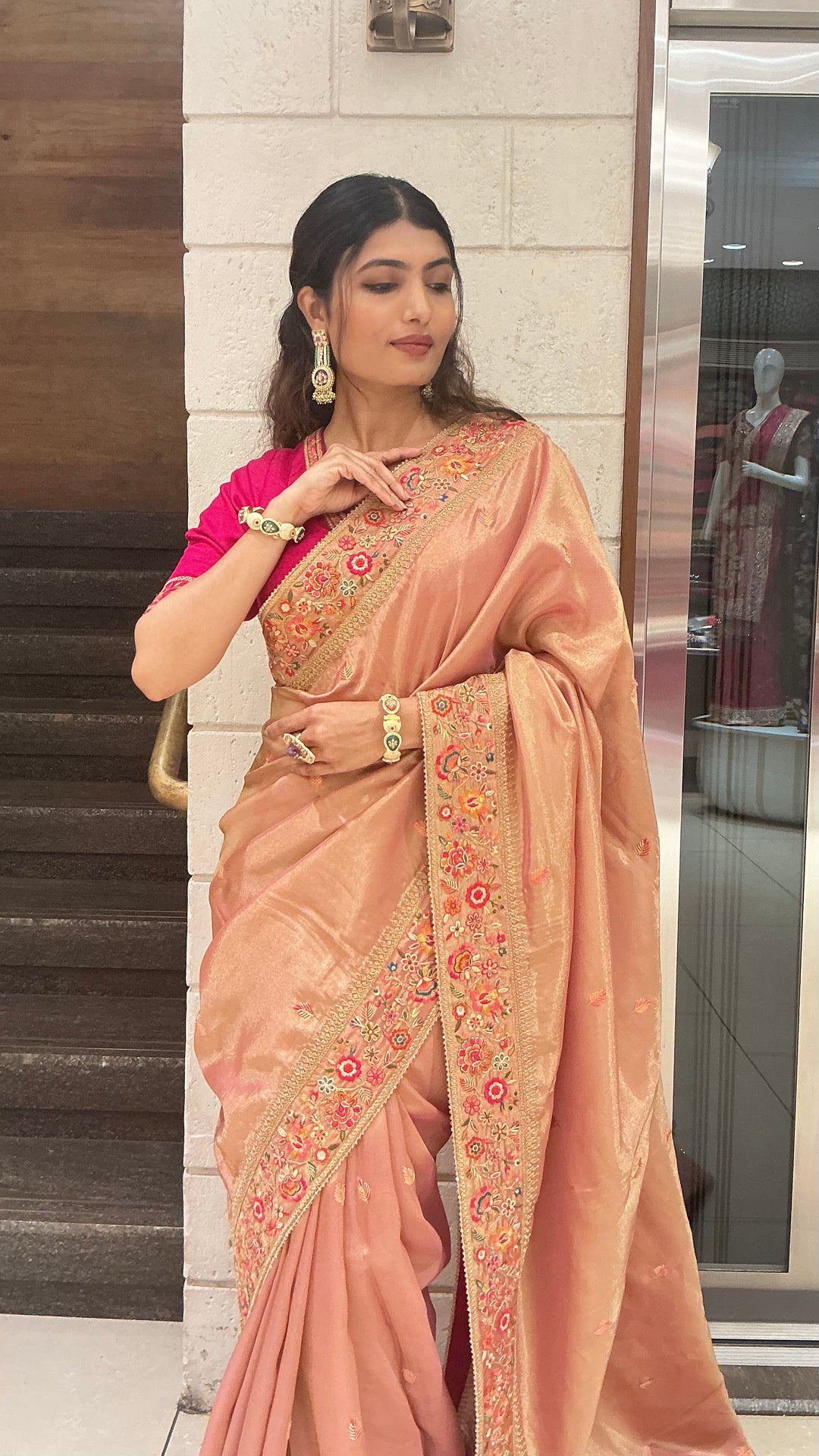Elegant Peach Gold Designer Saree with Floral Embroidered Border & Rani Pink Blouse